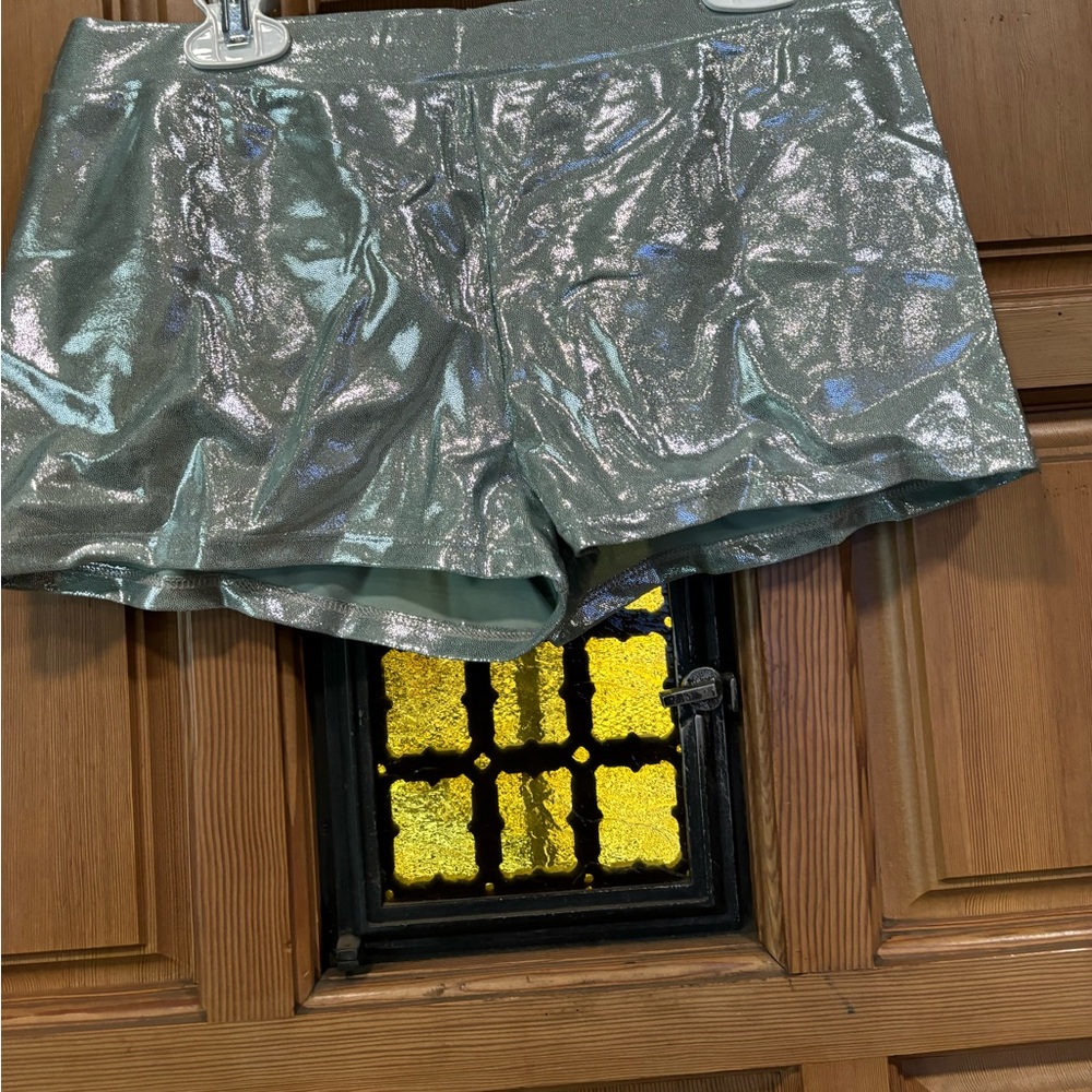 Silver sparkled booty shorts.